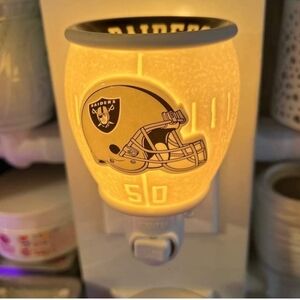 Wax wall warmer. RAIDERS